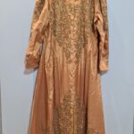 Gold silk dress with salwar and dupatta