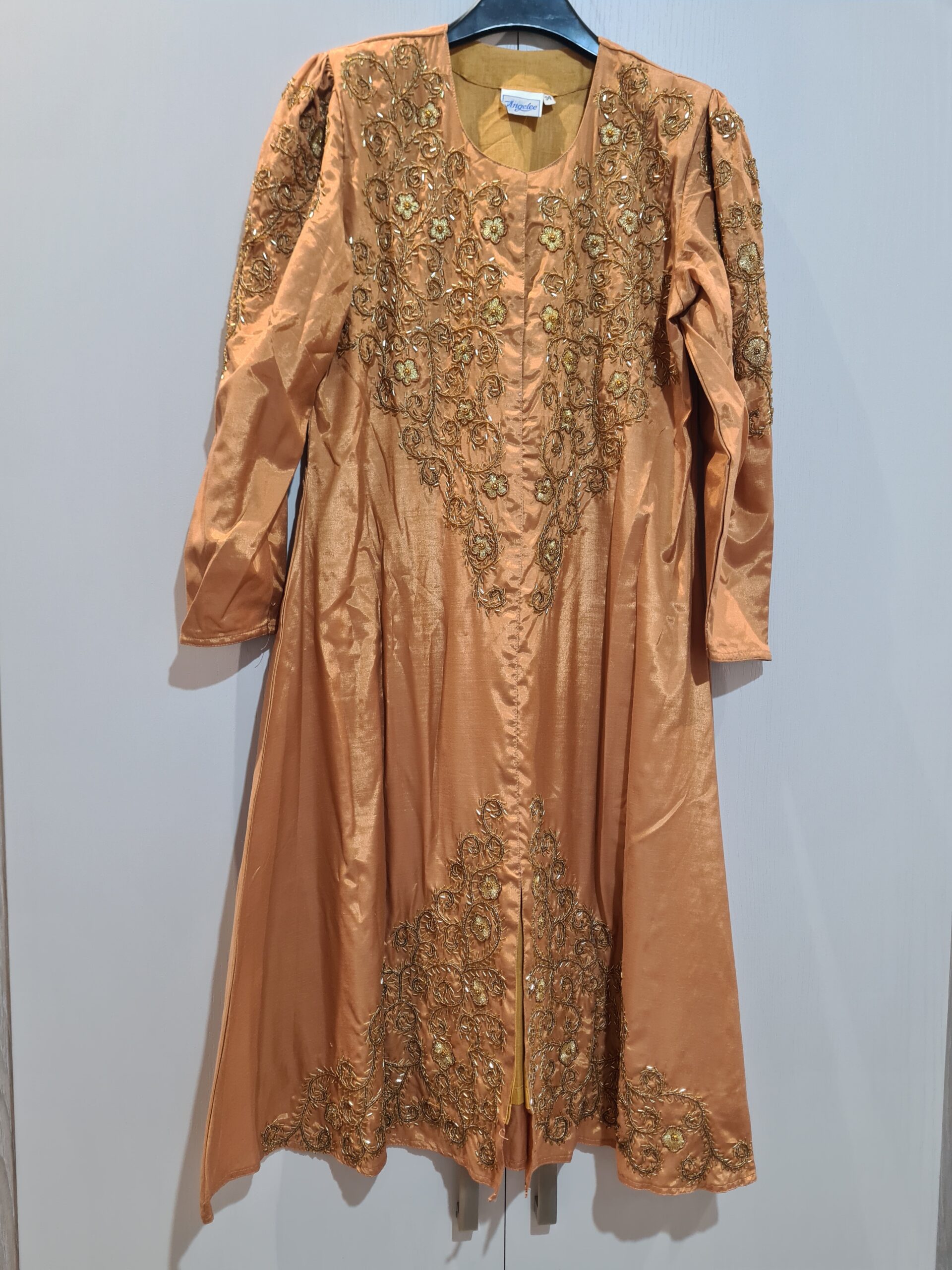 Gold silk dress with salwar and dupatta